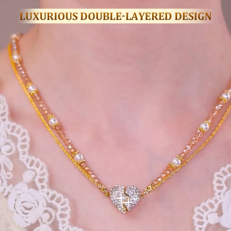 Magnetic necklace with a pair of separated hearts 1