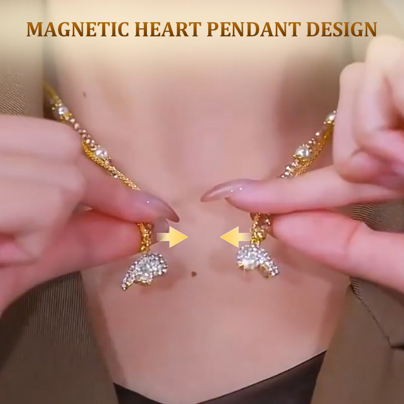 Magnetic necklace with a pair of separated hearts 2